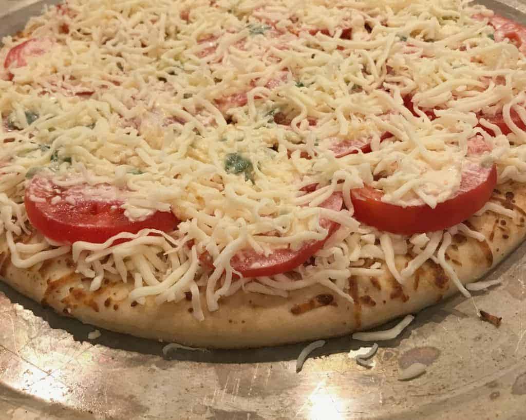Pizza completed and ready for the oven